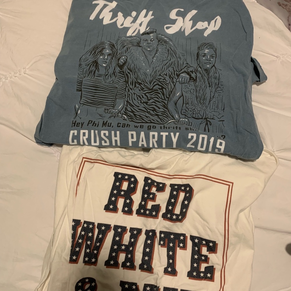 Two phi Mu shirts